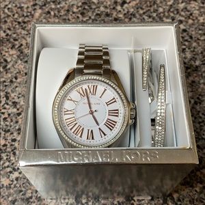 Michael Kors watch and bracelet set.
